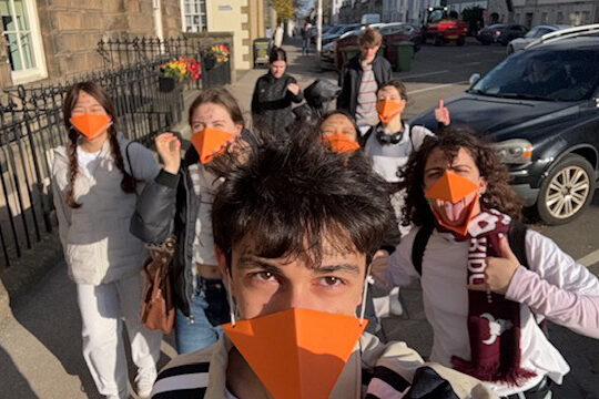 Charlotte and her academic family, in the duck costumes mentioned below (paper orange beaks).